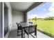 Relaxing covered patio with outdoor furniture at 3331 Private Oak Dr, Apopka, FL 32703