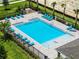 Community pool with plenty of lounge chairs at 3331 Private Oak Dr, Apopka, FL 32703