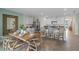 Kitchen and dining area with wood table and seating at 3674 Rory Oak Cir, Apopka, FL 32703