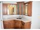 Modern bathroom vanity with dark wood cabinets and updated countertops at 772 Bear Creek Cir, Winter Springs, FL 32708