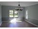 Formal dining room with chandelier and hardwood floors at 772 Bear Creek Cir, Winter Springs, FL 32708