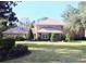 Brick home with landscaped yard and driveway at 772 Bear Creek Cir, Winter Springs, FL 32708