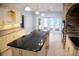 Modern kitchen with granite island and custom cabinetry at 772 Bear Creek Cir, Winter Springs, FL 32708