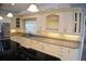 Kitchen features ample counter space and custom cabinetry at 772 Bear Creek Cir, Winter Springs, FL 32708