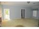 Spacious living room features fireplace, built-in shelving and access to backyard at 772 Bear Creek Cir, Winter Springs, FL 32708