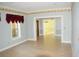 Spacious living room with hardwood floors and view to dining room at 772 Bear Creek Cir, Winter Springs, FL 32708