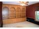 Home office with built-in shelving and neutral color palette at 772 Bear Creek Cir, Winter Springs, FL 32708