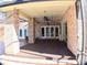 Brick patio with ceiling fan and access to backyard at 772 Bear Creek Cir, Winter Springs, FL 32708