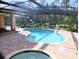 Enjoy this beautiful, freeform pool and relaxing spa at 772 Bear Creek Cir, Winter Springs, FL 32708