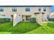 Private backyard with grassy area and patio at 8169 Roseville Rd, Davenport, FL 33896