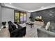Living room with two sofas, patterned rug, and TV at 8169 Roseville Rd, Davenport, FL 33896
