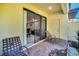 Patio with sliding glass doors leading to living room at 8169 Roseville Rd, Davenport, FL 33896