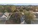 Two-story house with gray siding and a large backyard, aerial view at 117 Blue Heron Ct, Davenport, FL 33837