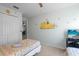 Winnie-the-Pooh themed bedroom with two twin beds and a TV at 117 Blue Heron Ct, Davenport, FL 33837