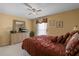 Bedroom with dresser and TV at 117 Blue Heron Ct, Davenport, FL 33837