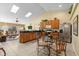 Kitchen with an island and view into the living room at 117 Blue Heron Ct, Davenport, FL 33837