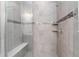 Large walk-in shower with tiled walls and built-in seat at 1330 Bolton N Pl, Lake Mary, FL 32746