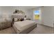 Spacious bedroom with large window and neutral decor at 3313 Private Oak Dr, Apopka, FL 32703