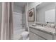 Clean bathroom with granite countertop, tub shower, and updated fixtures at 3319 Private Oak Dr, Apopka, FL 32703