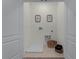 Small laundry room with a drain and shelving at 3319 Private Oak Dr, Apopka, FL 32703