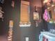 Unique bathroom with tiki masks and a vintage Waikiki poster at 336 E Kaley St, Orlando, FL 32806