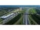 Aerial view of Emerson Pointe and surrounding roads and landscape at 576 Pothos St, Apopka, FL 32703