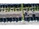 Aerial view of townhomes, showcasing rooftops and backyard spaces at 604 Madison Dr, Davenport, FL 33837