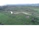 Aerial view of expansive land with a creek running through it at 604 Madison Dr, Davenport, FL 33837