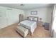 Spacious bedroom with a queen-size bed and ample closet space at 604 Madison Dr, Davenport, FL 33837