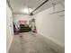 Attached garage with storage space and room for multiple vehicles at 604 Madison Dr, Davenport, FL 33837