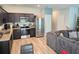 Modern kitchen with stainless steel appliances and granite countertops at 604 Madison Dr, Davenport, FL 33837