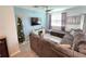 Living room with sectional sofa and Christmas tree at 604 Madison Dr, Davenport, FL 33837