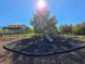 Community playground with playset and safety surfacing at 604 Madison Dr, Davenport, FL 33837