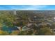 Aerial view showcasing community pool and surrounding buildings at 620 Cranes Way # 207, Altamonte Springs, FL 32701