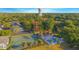 Aerial view showing tennis courts, pool, and surrounding community at 620 Cranes Way # 207, Altamonte Springs, FL 32701