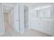 White bathroom with updated vanity and toilet at 620 Cranes Way # 207, Altamonte Springs, FL 32701