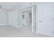 Bright bedroom with hardwood floors and access to the bathroom at 620 Cranes Way # 207, Altamonte Springs, FL 32701