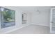 Bedroom with hardwood floors, ceiling fan, and large windows at 620 Cranes Way # 207, Altamonte Springs, FL 32701