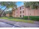 Condo building with landscaping and convenient parking at 620 Cranes Way # 207, Altamonte Springs, FL 32701