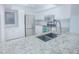 Modern kitchen featuring stainless steel appliances and granite countertops at 620 Cranes Way # 207, Altamonte Springs, FL 32701