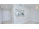 Living room with kitchen pass-through and light gray walls at 620 Cranes Way # 207, Altamonte Springs, FL 32701