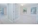 Bright and airy living room with hardwood floors and large windows at 620 Cranes Way # 207, Altamonte Springs, FL 32701