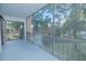 Relaxing screened balcony overlooking a wooded area at 620 Cranes Way # 207, Altamonte Springs, FL 32701