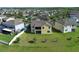 Aerial view of house showcasing backyard and neighborhood at 15121 Evergreen Oak Loop, Winter Garden, FL 34787