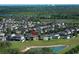 Aerial view of house and surrounding area at 15121 Evergreen Oak Loop, Winter Garden, FL 34787