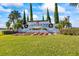 Lakeshore community entrance sign with festive holiday decorations at 15636 Shorebird Ln, Winter Garden, FL 34787