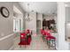 Elegant dining room features a chandelier and red accents at 1913 Westover Reserve Blvd, Windermere, FL 34786