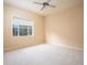 Bright bedroom with ceiling fan and window at 3277 Lakeview Oaks Dr, Longwood, FL 32779