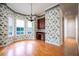 Breakfast area with built-in cabinetry and floral wallpaper at 3277 Lakeview Oaks Dr, Longwood, FL 32779