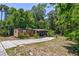 Single-wide mobile home with a small yard at 4750 N Ronald Reagan Blvd, Sanford, FL 32771